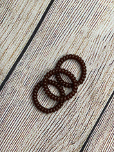 Load image into Gallery viewer, Translucent Spiral Hair Ties
